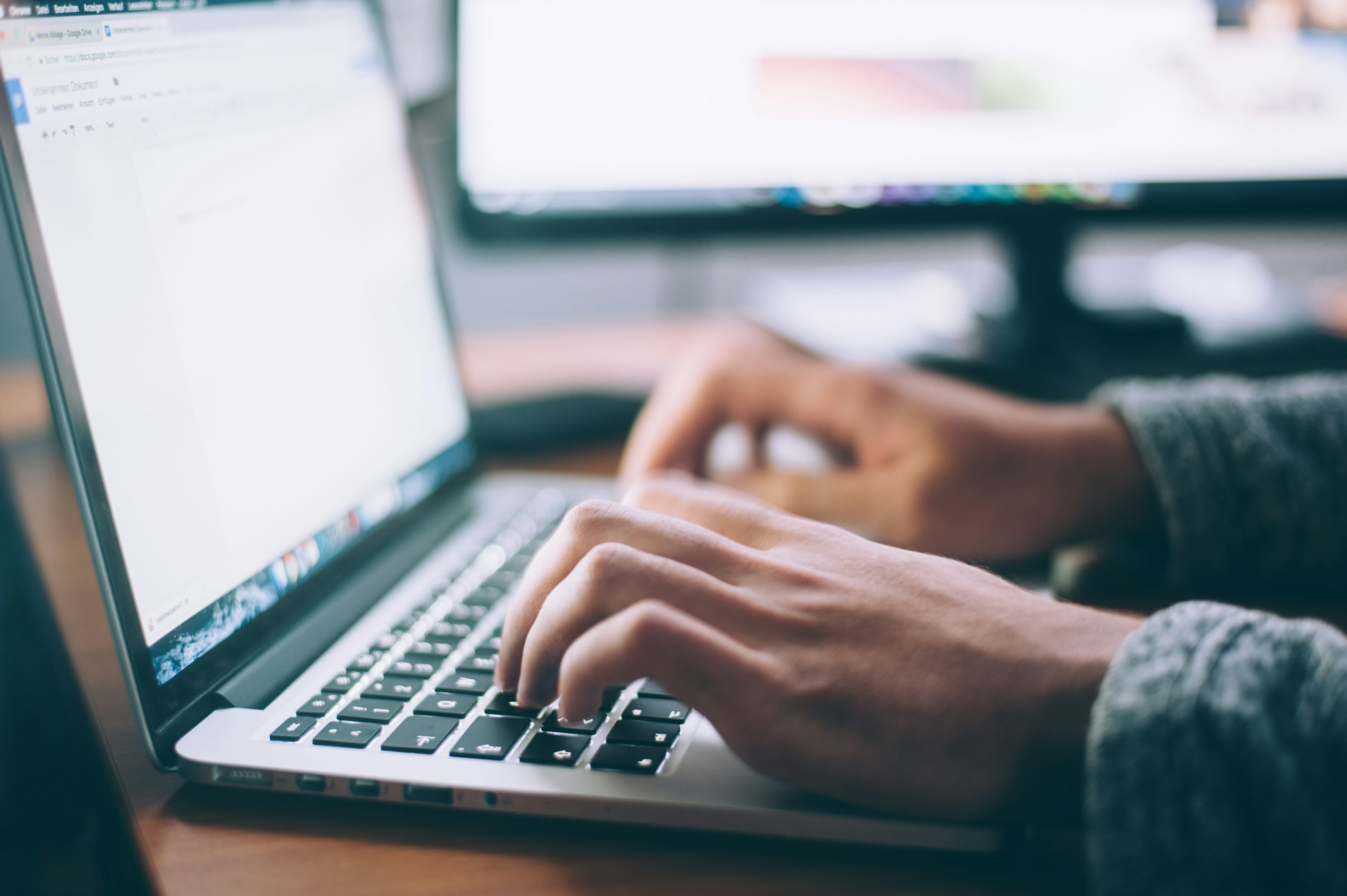 Typing on Laptop